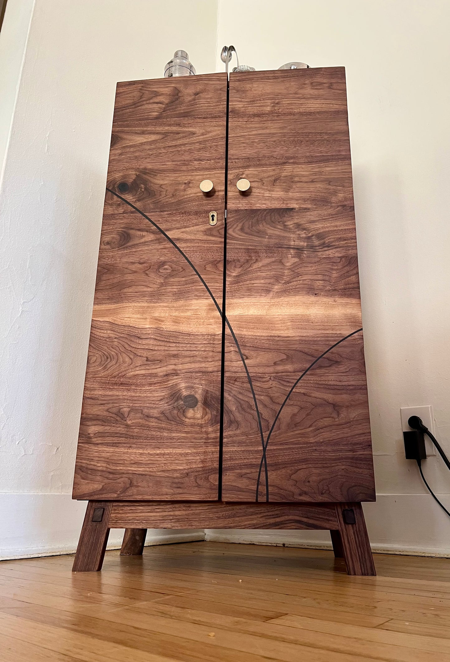 American walnut liquor cabinet with Birdseye maple accents